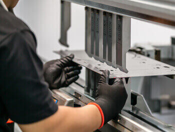 Technician performing a custom welding job.